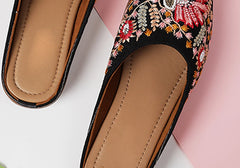 Striking Black Mules with Vibrant Mixed-Color Embellishments